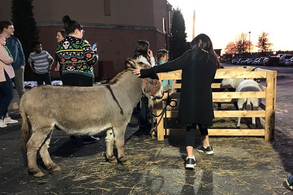 David greeting guests at Christmas Eve Services