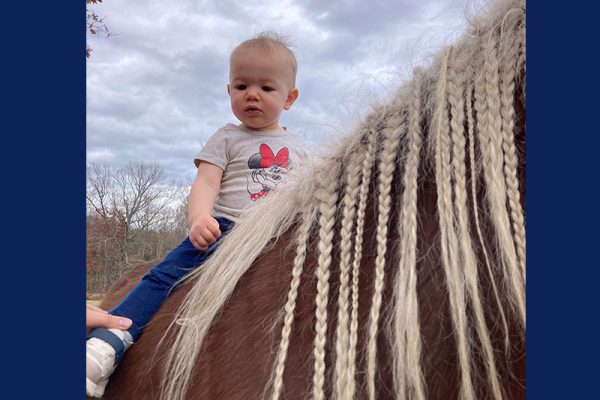 Ginger has given many first rides! Ellie (11mo) is enjoying her first ride!